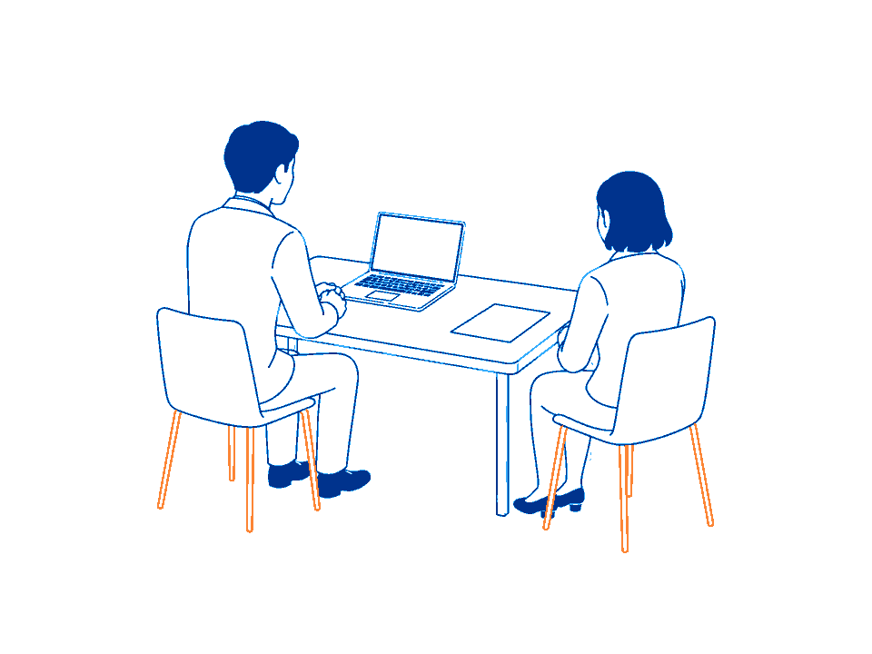 机を挟んで相談している2人のイラスト